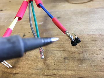 Now, plug the ground wires into GND on