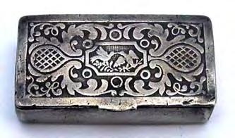 Geometric patterned snuff box covered all over with engine turned decoration.