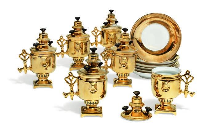 816 816 KUZNETSOV PORCELAIN MANUFACTORY, C. 1900 A set of six Russian porcelain cups with matching underplates and lids, of samovar form, decorated in black and gold.