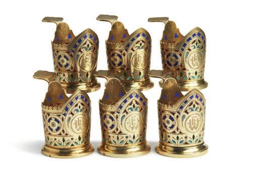 DKK 15,000 / 2,000 817 817 ANTIP IVANOVICH KUZMICHEV, MOSCOW 1892 A set of six Russian silver-gilt and pliqueà-jour enamel miniature teaglass-holders for vodka, bodies