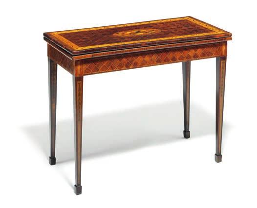 852 852 A Russian Louis XVI rosewood and stained fruitwood marquetry games table, the playing surface lined with red fabric (replaced),