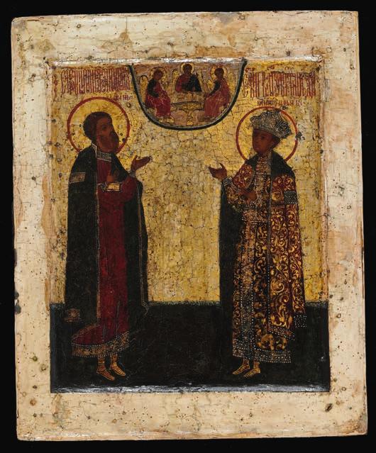 726 726 STROGANOV SCHOOL, 17TH CENTURY A Russian icon depicting Tsarevich Dmitri and Prince Roman of Uglich and above The Old Testament Trinity. Tempera on wood panel with double kovcheg.