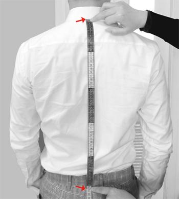 VEST LENGTH Measure from the lower point of the rear collar all the way