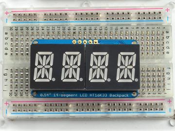 Add the Backpack: Place the backpack board over the pins so that the short pins poke through the breakout pads Solder all 5 pins! That's it!