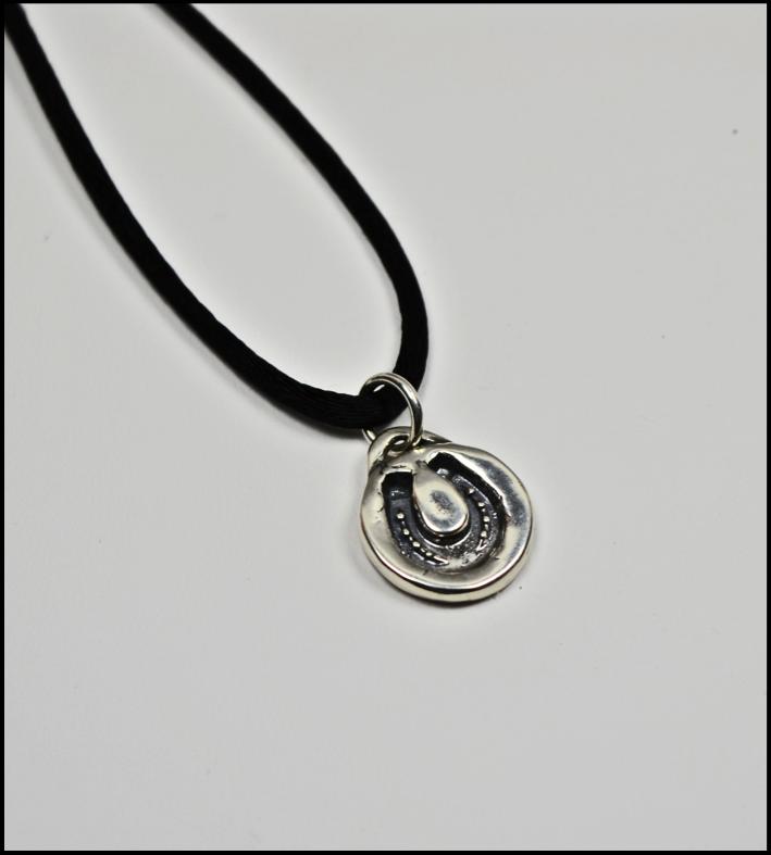 Includes gift box. Pendant $48. Pendant with 16 black satin necklace $68. B.