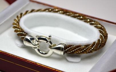 Simple Elegance Bracelet $165 A beautifully elegant 5mm spiral braid is accented by an oversized sterling silver