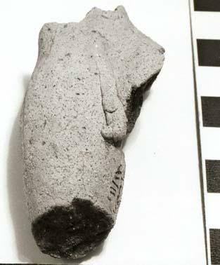 Seven figurine fragments were found in this level, consisting of 1 torso, 5 limb fragments, and 1 animal figurine. All of the figurines are solid in composition.