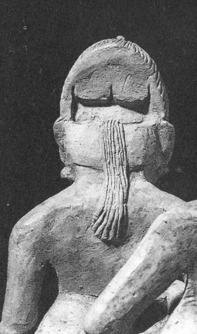 Venta Stela 1 Female figure with helmet and low-slung