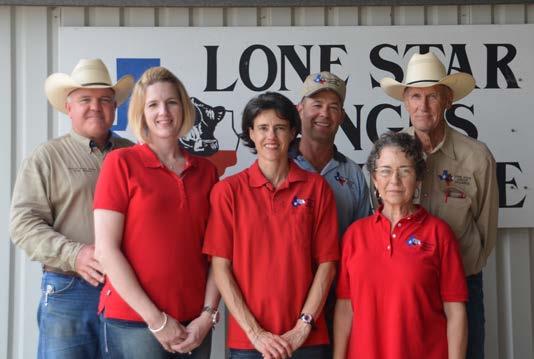 L to R: Doug & Julie Willard, Mark & Karen Janak, and EM & Nancy Holt We are proud of our offering of more than 125+ registered Angus bulls.