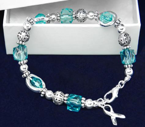 A flexible bangle bracelet that has the words We re In This Together with teal ribbons. Adult Size: (B-22-3WT) 7.5 in.