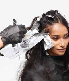 Leave a slice of natural hair, then take a diagonal weave parting and apply