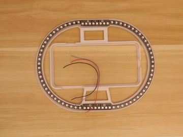 Then, grab a piece of wire and see how long it needs to be to reach the neopixrl ring to the middle of the part as shown in the picture.