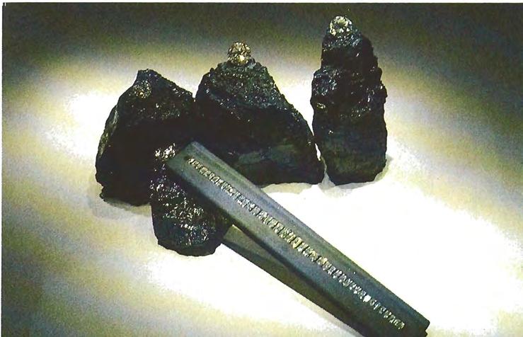 q MI. Figure 7. The new exhibit is particularly strong in diamonds, and the technique of displaying them on coal is but one example of the museum's innovativeness.