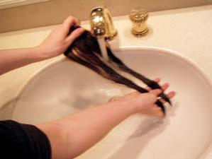 Remove hair pieces from head prior to washing, and wash each hair piece separately. Be sure to use cool water only. DO NOT SCRUB THE HAIR PIECES.