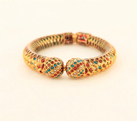 enamel work make this beautifly crafted bangle enchanting to