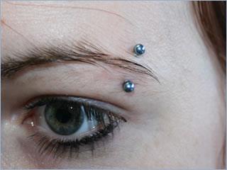 Hair must cover these piercings at all times.
