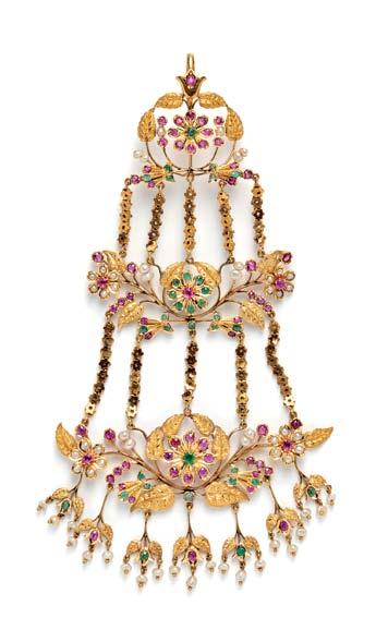 446 446 18kt Gold Gem-set Head Ornament (Jhumar), India, the three graduating sections designed as flowers and finely engraved foliage set with rubies and emeralds, pearl accents, and floral and