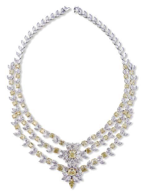 Highlights of the collection include a long, asymmetrical diamond necklace embellished with an 18.
