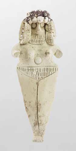 Mesopotamian Collection D. 15907 12. FEMALE FIGURINE Clay, bitumen Iraq, Eshnunna (modern Tell Asmar), Trench D Excavated under the direction of Henri Frankfort, 1935 1936 Isin-Larsa period, ca.