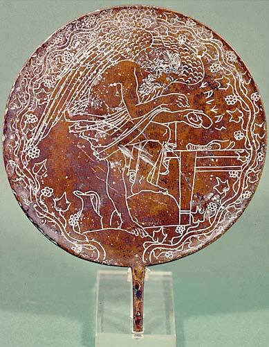 Bronze mirrors were very popular with the Etruscans. They were often engraved on the back like this one with a mythological scene.