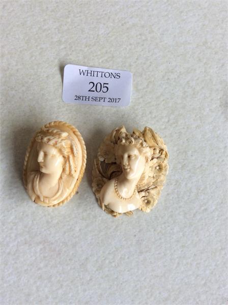 205 Two carved ivory