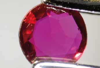 SSEF RESEARCH SYNTHETIC RUBY WITH ESKOLAITE INCLUSION End of 2016, a ruby necklace containing 69 rubies in total was submitted for testing.