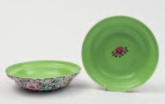 100-200 552 A pair of Chinese fluted bowls the exteriors painted with a millefleurs design, the interiors with a single pink peony spray on a lime green ground, iron-red seal marks, early 20th