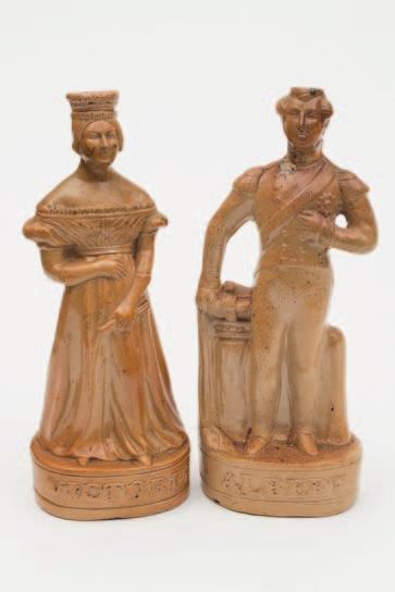 578 A pair of Stephen Green salt glazed stoneware spirit flasks in the form of the young Queen Victoria and Albert the Prince Consort, both