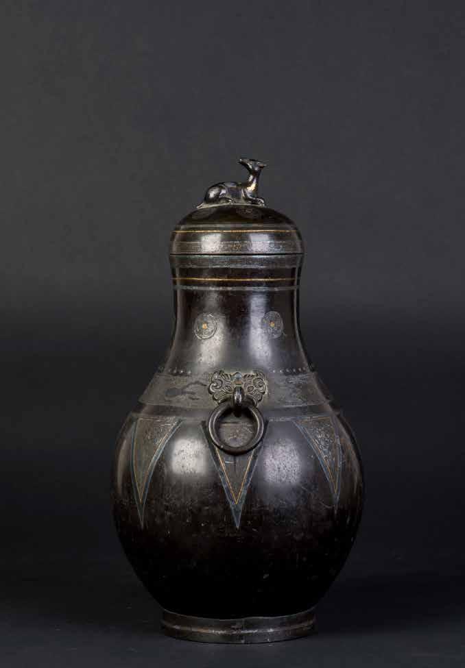 1014 十九世纪铜仿古嵌金银铺首鹿纽尊 A CHINESE BRONZE ZUN VASE A Chinese bronze vase.