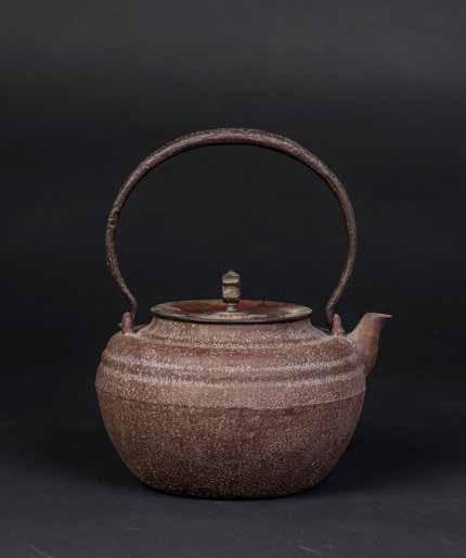 Height 9 Width 7 1029 龟文堂造金银镶嵌山水楼阁波千鸟系铁壶 A JAPANESS TETSUBIN CAST IRON TEAPOT A highly decorative, turtle shaped Japanese cast iron teapot.