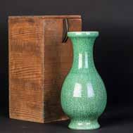 bright green glaze, a white crackle glaze to the interior rim and to the base.
