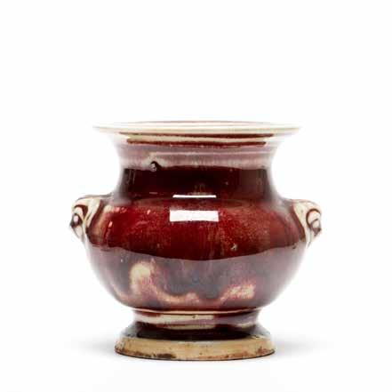 5 $200-300 1085 清红釉观音尊 A LANGYAO RED GLAZE VASE Langyao Guanyinzun, the vase is potted with a long slender body above a