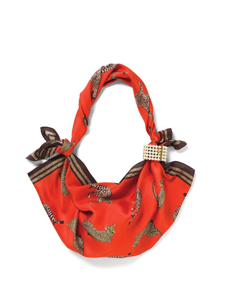Forgot a carryall? Create your own! Two scarves make the perfect little boho bag.