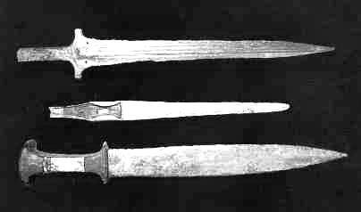 After clearing encrustation, the dagger (middle right) was interpreted to be of Syro- Palestinian origin, as did a sword, with ivory and ebony inlaid hilt (bottom right); it is here displayed with a