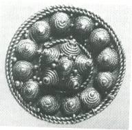 box brooch, a penannular brooch or even a ring-headed pin.