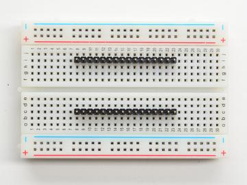 breadboard with the short side sticking up.