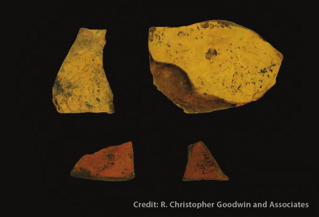 Another stone (seen on the right of the photo below), held in the hand to crush the mineral against the palette, is still covered in red pigment.
