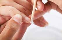 2 2 Use a pusher to slide off the softened nail tip. Be careful not to pry the nail tip off because you can damage the nail unit.