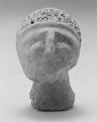 21) Head of a woman wearing a veil, a fillet with a central bead, and a coiled torque necklace;