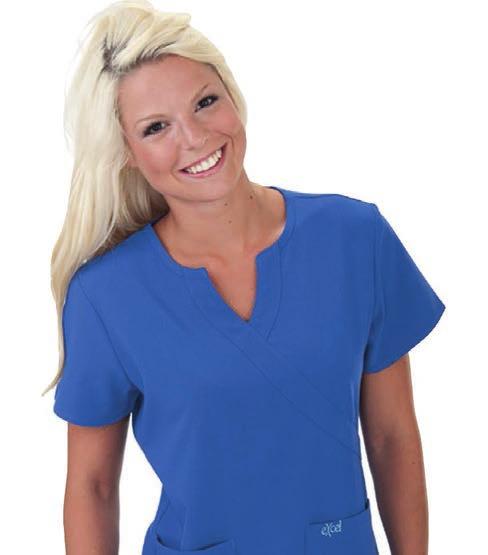 Top Style #511 Excel Accuflex Elastic back for a fitted look Side panels Mock wrap top 2 patch pockets Centre Back Length: 26 / 66.