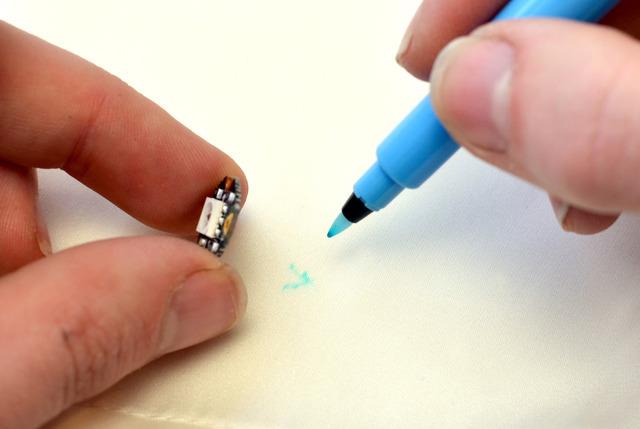 Lift each component and make a mark with a water-soluble marking pen (or just use a very fine tip