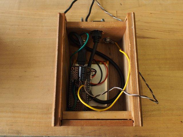 Leave the relay wires running out of the box, and then close its lid.