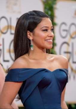 While Gina Rodriguez ( Jane the Virgin ) paired emerald and diamond fringe chandeliers by Neil Lane with her strapless