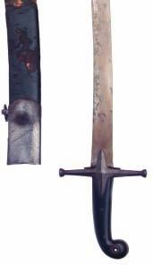 .. Taqi, 910 (AD1504-5), on the edge, a couplet in Persian in praise of Ali 500-600 5 AN INDO-PERSIAN SHAMSHIR, 17TH/18TH CENTURY with single-edged watered steel blade, steel cross-piece retaining