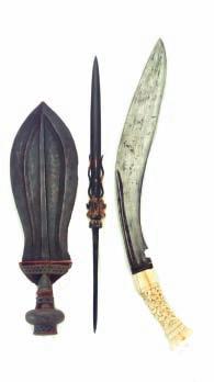 in its original leather-covered wooden scabbard decorated with three raised bands at the top 99cm; 39in blade 800-1000 257 A RARE INDIAN TALWAR FOR A CHILD, 18TH CENTURY with slightly curved blade