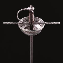 306 307 306 A FINE SPANISH CUP-HILT RAPIER, CIRCA 1680 with slender blade of flattened hexagonal section, stamped Tomas Daiala and En Toledo within a short fuller on the respective faces (rubbed),