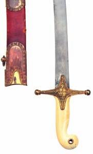 24 25 26 24 A MAMELUKE-HILTED CAVALRY OFFICER S SWORD, SECOND QUARTER OF THE 19TH CENTURY with earlier curved single-edged watered Eastern blade (areas of pitting), white-metal cross-piece cast and