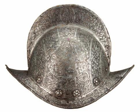 358 358 A FINE GERMAN ETCHED COMB-MORION CIRCA 1580, PROBABLY NUREMBERG formed in one piece, with hemispherical skull rising to a high medial comb roped along its apex, and an integral brim turned