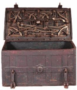 369 369 A GERMAN IRON STRONG BOX, LATE 17TH/18TH CENTURY formed of a series of large iron plates overlaid with broad interlaced iron bands, fitted with a pair of hasps at the front for securing the