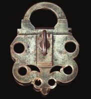 8cm; 3N in by 9cm; 3I in 800-1000 372 373 A FINE GERMAN STEEL PADLOCK, SECOND HALF OF THE 16TH CENTURY with pierced scrolling body of symmetrical construction, the central portion raised on each